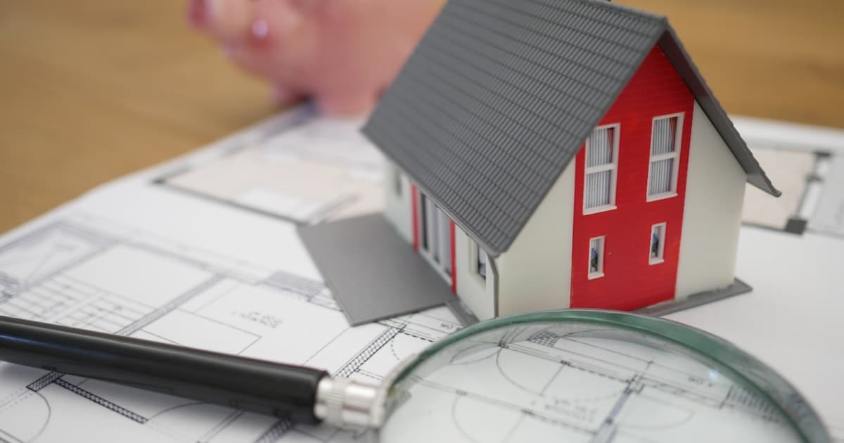 Couple receiving house keys from real estate agent